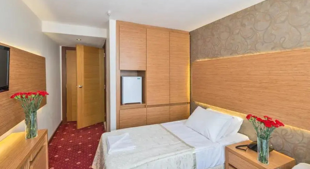 Кровать в общем номере Erbazlar Hotel