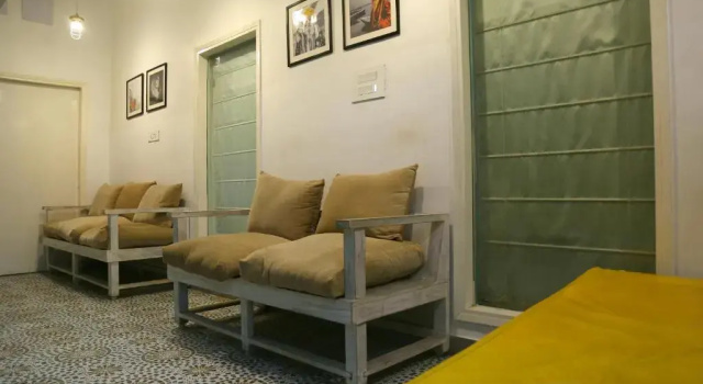 Кровать в общем номере Stay Banaras - A Boutique Hotel
