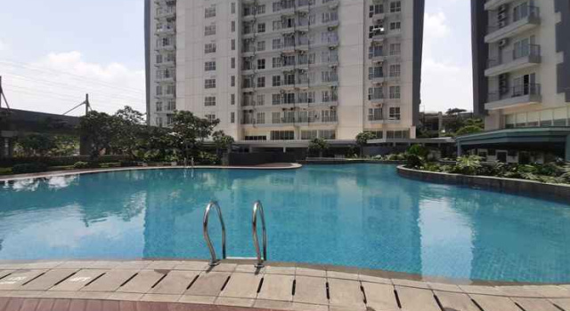Modern and Compact Studio Room at Casa De Parco Apartment By Travelio, Boek Appartement Legok West Java