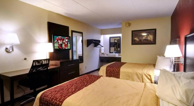Четырёхместный номер Deluxe American Inn & Suites Bishop Airport Flint