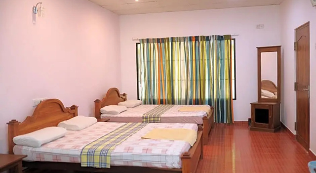 Кровать в общем номере Wilpattu Dilsara Holiday Resort