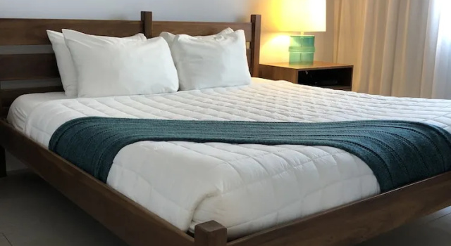 Апартаменты Tides Inn Hotel