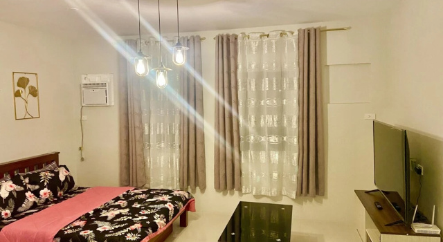 camella manors CONDO unit with free WIFI, Забронировать Отель Баколод Negros Occidental