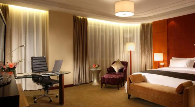 Номер Executive Tianjin Saixiang Hotel
