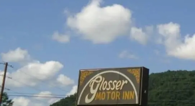 Кровать в общем номере Knights Inn Paxinos Elysburg