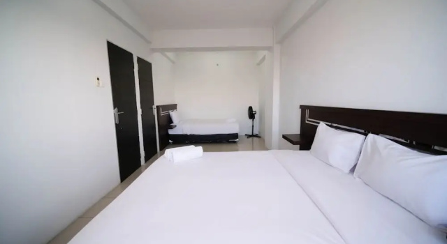 Appartamento Simple 2Br With Extra Bed At Menara Rungkut Apartment