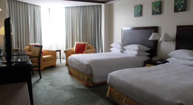 Четырёхместный номер Deluxe Miri Marriott Resort & Spa