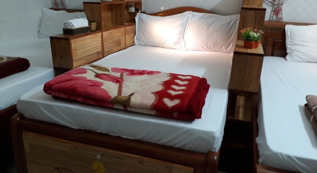 Кровать в общем номере Thao Hieu Homestay Hoi An