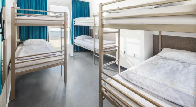 Кровать в общем номере Haus KLIPPER Norderney