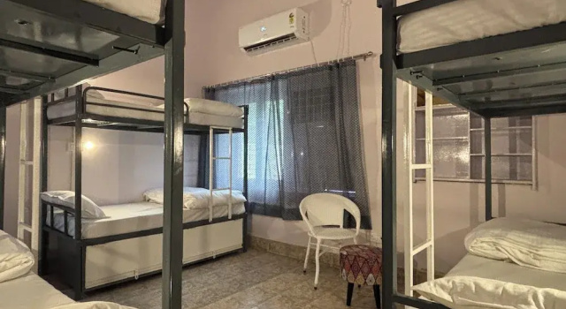 Кровать в общем номере (женский номер) Dormtales Hostel