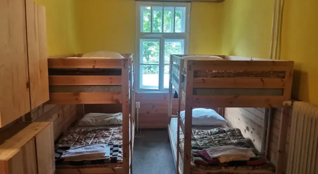 Кровать в общем номере Hostel pod Voglom
