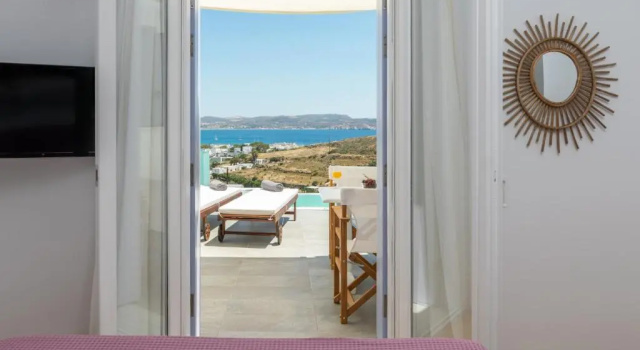 Студия Milesian Suites