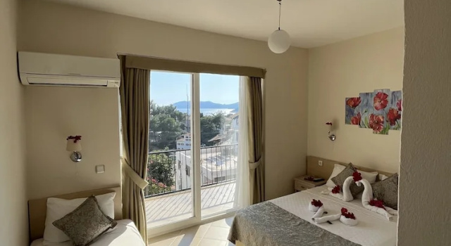 Трёхместный номер Standard с балконом Talay Otel