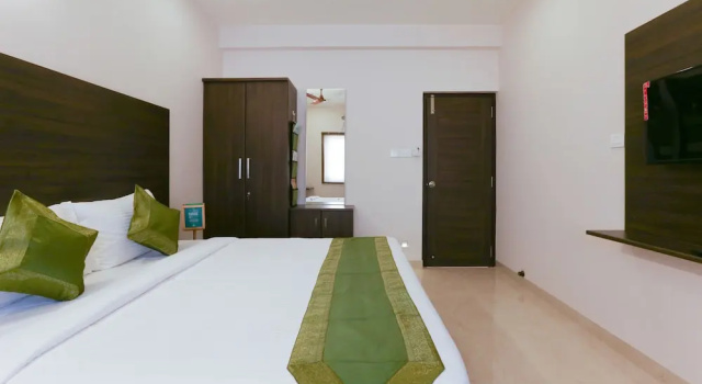 Номер Deluxe Treebo Hi Line Apartments Kalapatti
