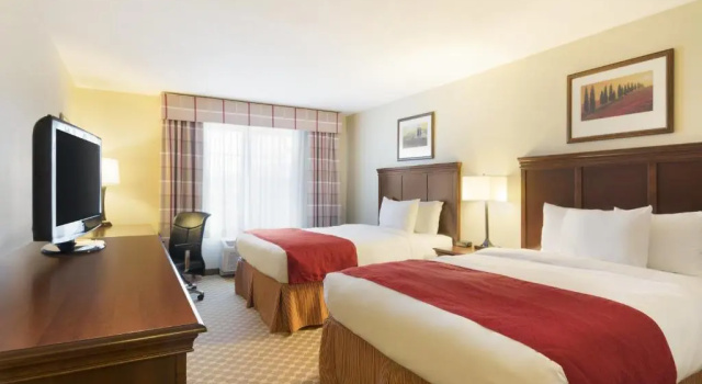 Четырёхместный люкс c 1 комнатой Country Inn & Suites by Radisson, Covington, LA