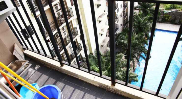 Clean 2BR with Pool View Mutiara Bekasi Apartment By Travelio, Book Apartment Bekasi Hotels with a Pool, Swimming Pool