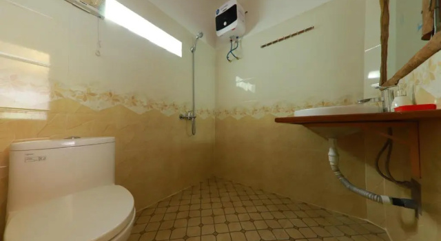 Кровать в общем номере Tropical Valley Homestay - Villas