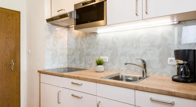 Апартаменты с 2 комнатами с балконом Apartments Tannheim - bei Birgit Mariacher - inklusive Sommerbergbahnen - Infrarotsauna & Brötchenservice - zentral mit Bergblick