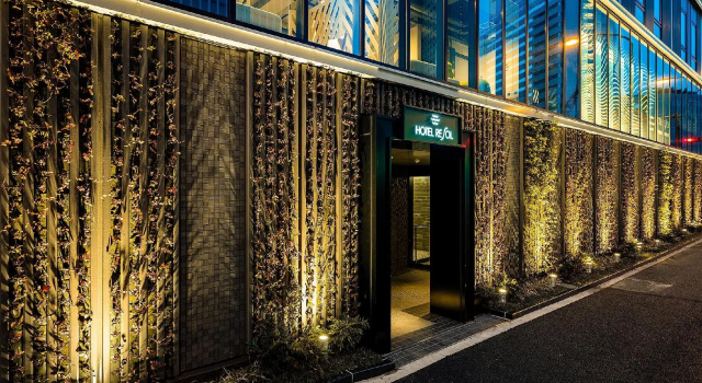 Кровать в общем номере Hotel Resol Yokohama Sakuragicho