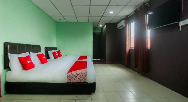 Люкс OYO 90124 Payang Puri Baru Hotel
