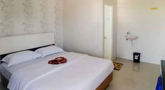 Standard- dobbelt værelse Griya Mulya near Alun Alun Batu Mitra RedDoorz