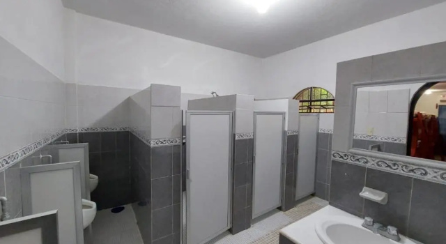 Кровать в общем номере Hotel Casa Kolping