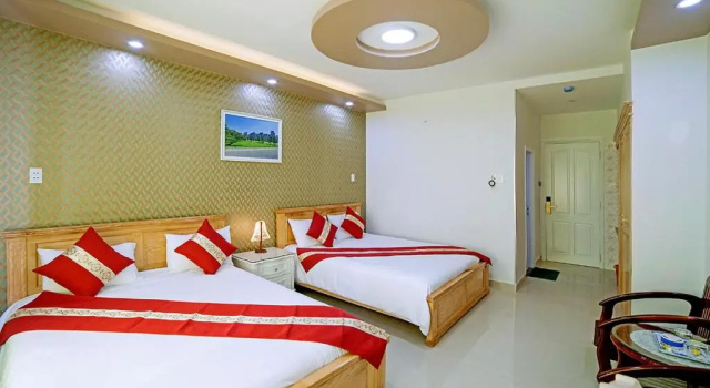 Номер Deluxe Khách Sạn Quốc Cường-Dì Tám