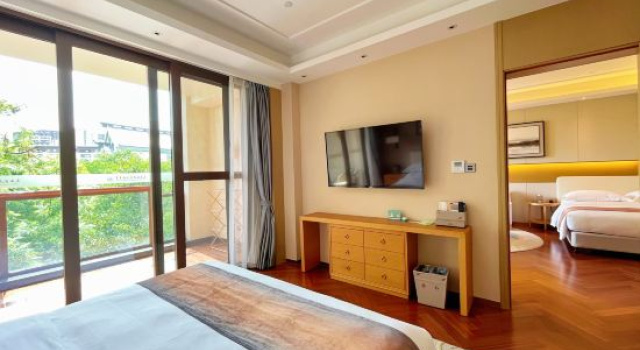 Семейный люкс Qing Hua Hai Guan Fang Garden Hotel