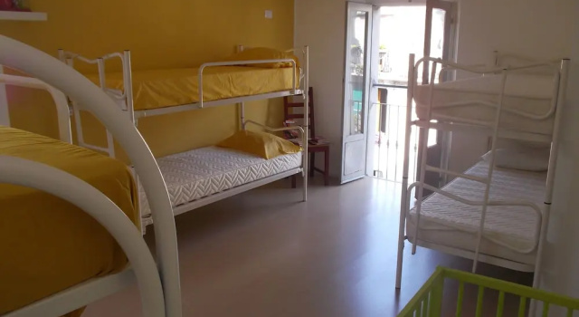 Кровать в общем номере с балконом Gogol'Ostello & Caftè Letterario - Hostel
