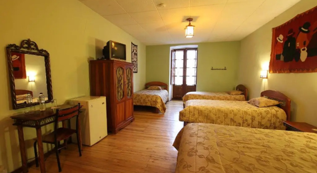 Кровать в общем номере Mía Leticia B&B