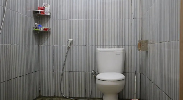 Pat în dormitor Sutriyanto Homestay - Hostel