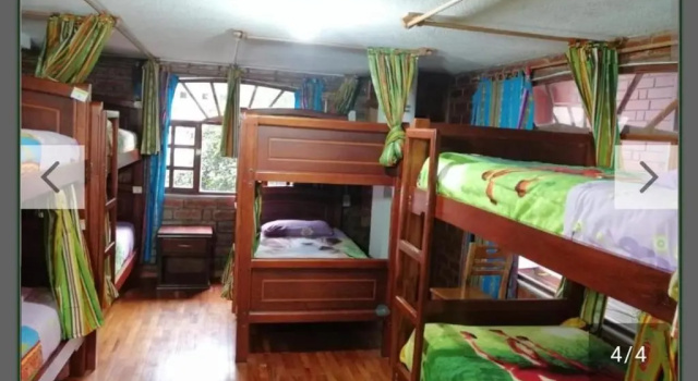 Кровать в общем номере Hostal D´Mathias