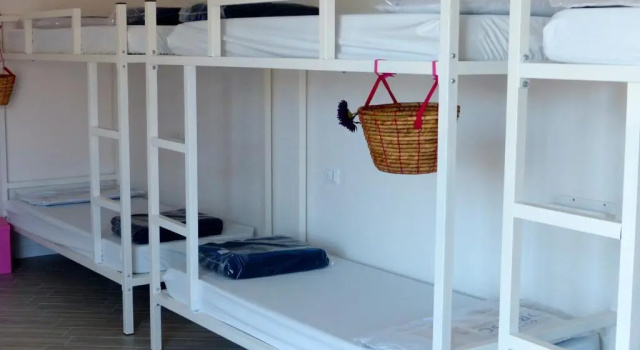 Кровать в общем номере Meet Gardalake Hostel