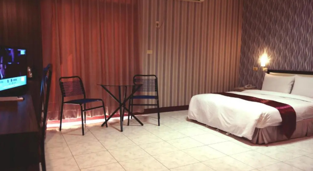 Номер Deluxe Jiuning Business Hotel
