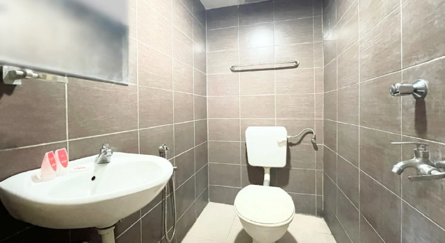 Номер Deluxe OYO 90324 Muar Station Hotel