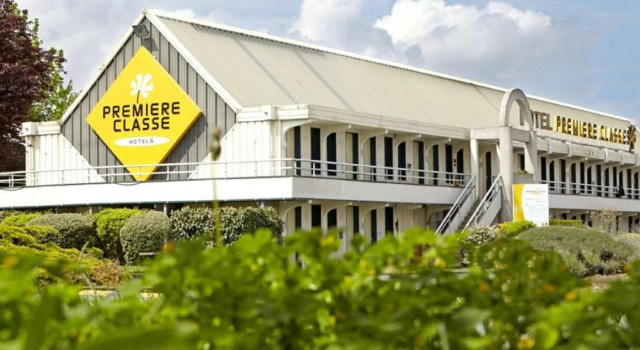 Кровать в общем номере Premiere Classe Vierzon