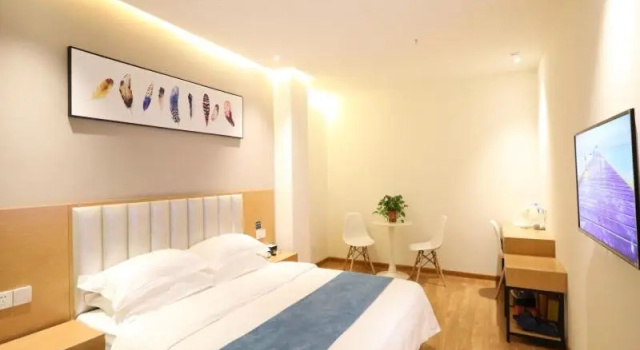 Shell Xinzheng Airport Port Huaxia Avenue Hotel, Rezerwuj Hotel Xinzheng Henan