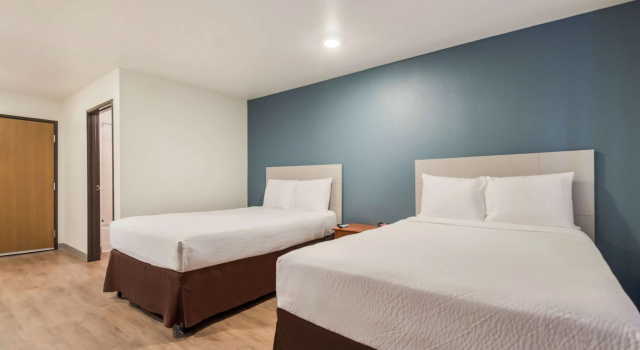 Четырёхместный номер Standard WoodSpring Suites Houston La Porte