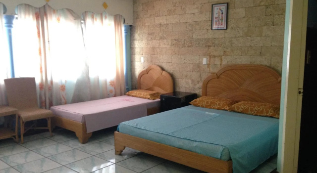 OK Pensionne House, Забронировать Отель Думагете Negros Oriental