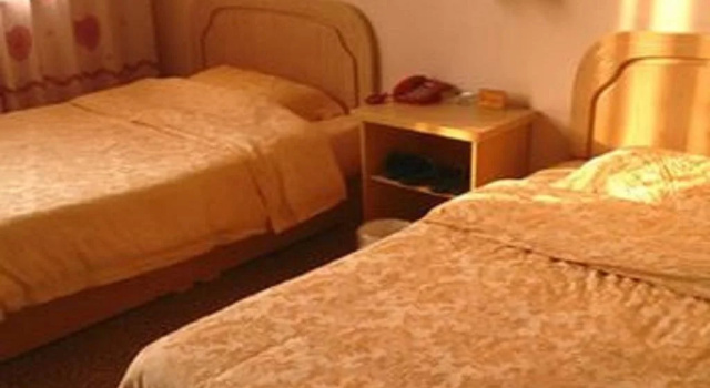 Kelinning Hotel West Coast Bus Terminal, Забронировать Отель Хуандао Циндао