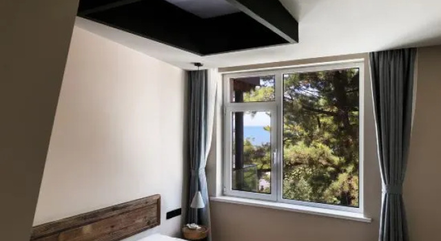 Семейный люкс с 2 комнатами с видом на море Liyu Designer Hot Spring Homestay (Lushan Scenic Area)