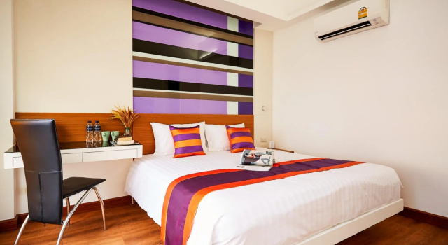 Кровать в общем номере Studio Asoke