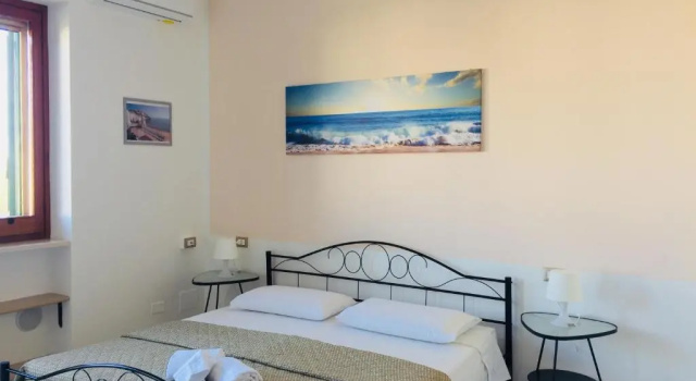 Четырёхместный номер Standard B&B Pizzomunno e Cristalda Rooms