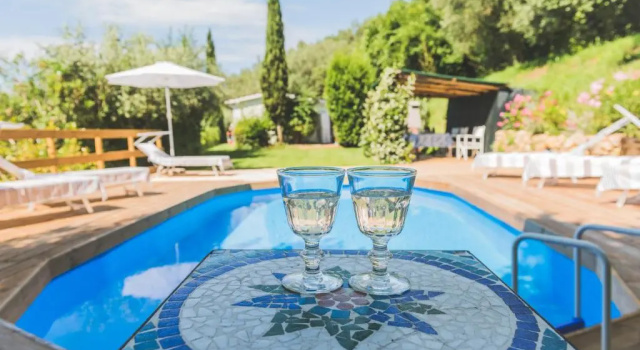 Коттедж Exclusive beautiful pool house surrounded by greenery, modern, luxury finishes