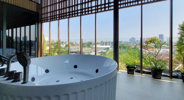 Кровать в общем номере SHAN Villas Sukhumvit ฌานวิลล่า สุขุมวิท