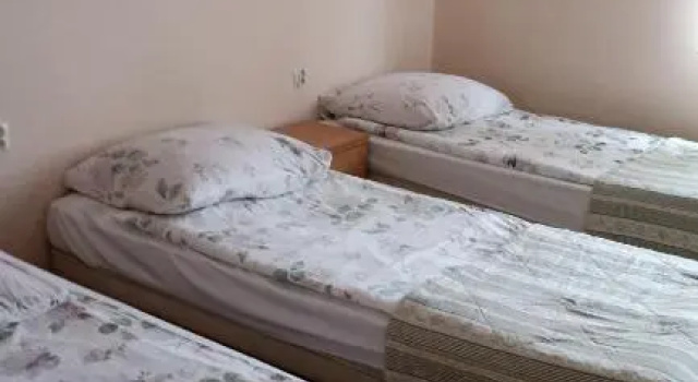 Кровать в общем номере (мужской номер) Hotelik Gościnny