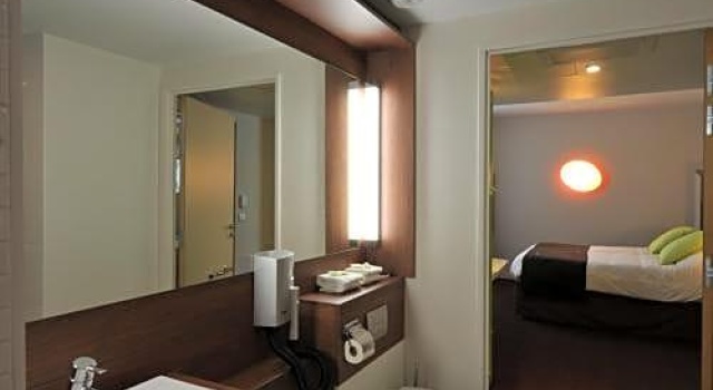 Кровать в общем номере ibis Lyon Sud Oullins