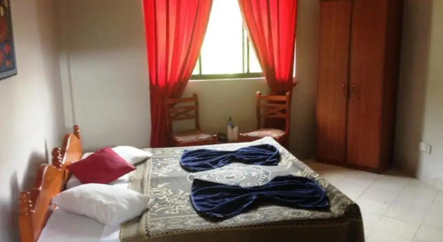 Кровать в общем номере Kandy View Hotel
