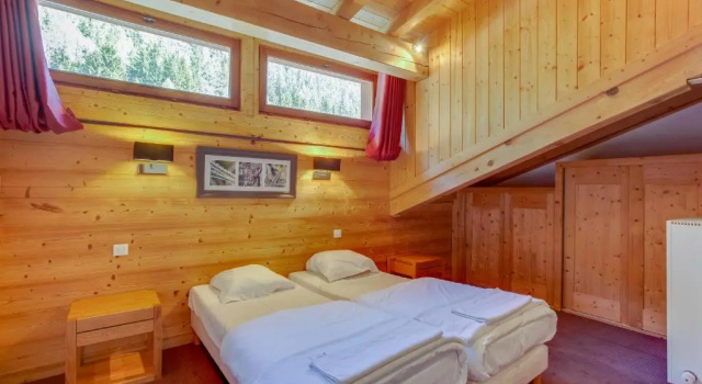 Кровать в общем номере Дуплекс с 2 комнатами Dormio Resort Les Portes du Mont Blanc
