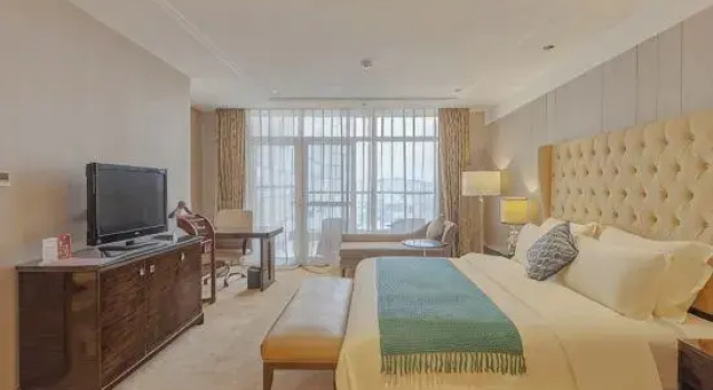 Люкс Landbridge Jinjiang Hotel